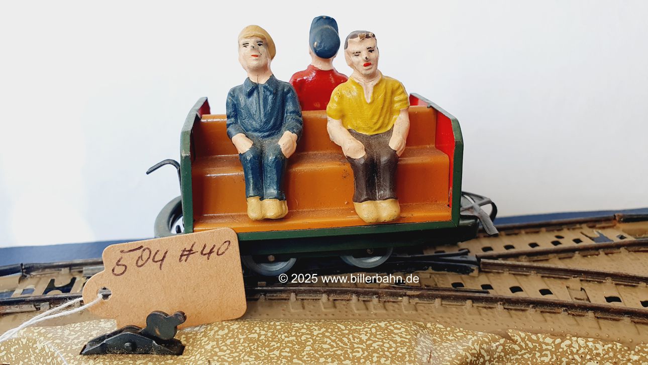 blauer Arbeiterwagen mit heller Bank