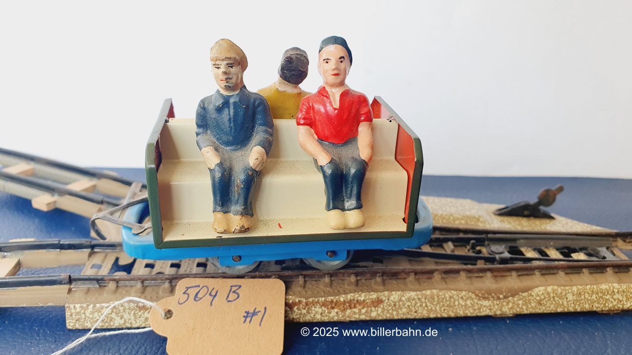 blauer Arbeiterwagen mit heller Bank