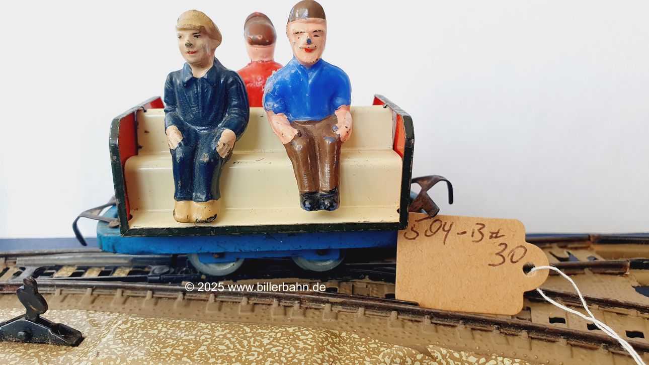 blauer Arbeiterwagen mit heller Bank