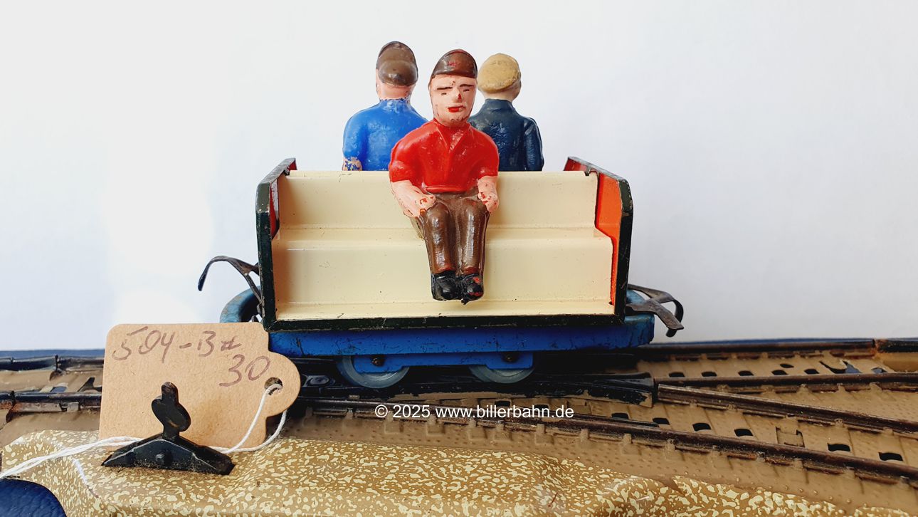 blauer Arbeiterwagen mit heller Bank